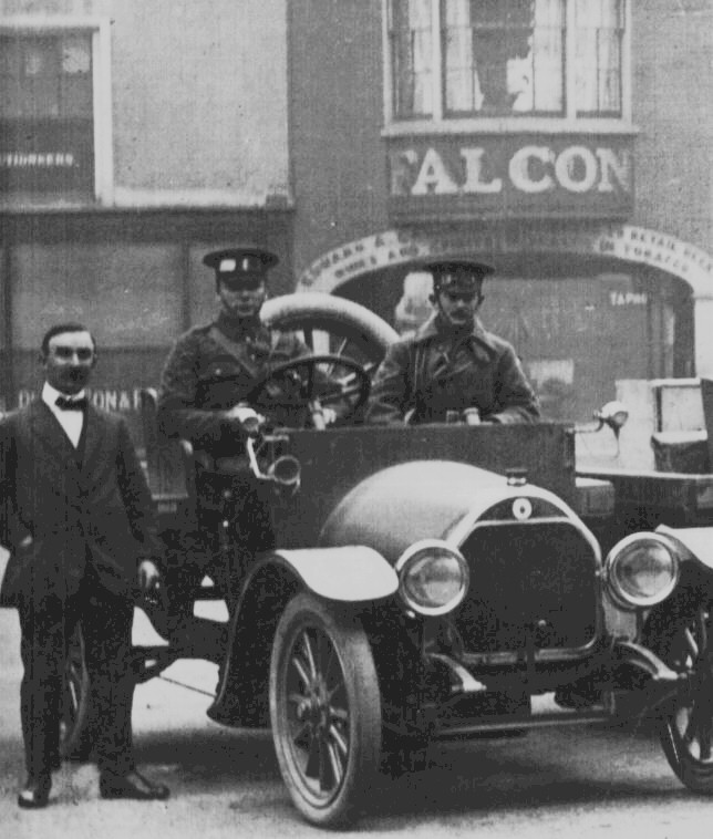 These photos are of the transport section of the HCB the one to the left is   taken outside the 'Falcon' public house in Market Square Huntingdon.  Its location is almost on the same spot as the Huntingdon War memorial was located after the war. there was some communication in the local press and between interested parties at the time of the planning of the memorial that the statue should be of a Hunts. Cyclist, but, after heated debate,  it was decided to erect a statue of  ' A Thinking Soldier' .  The photo is only a small part of a larger photo showing a line of seven cars all converted for the use of the H C B by the local garage Messrs. Murket Bros..   Mr. Murket can be seen standing next to the car.